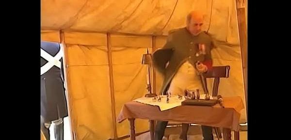  On the eve of Waterloo battle , an old general-revisionist  presents Napoleon with a gift of two prostitutes, serviced by him and young adjunct